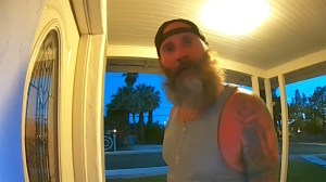 A man was caught on camera threatening to rape and kill a woman.