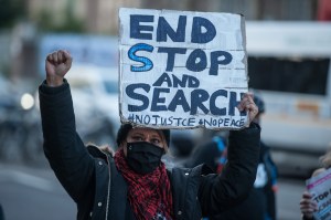 Activists and community groups block the A10 road outside of Tottenham Police Station in protest at the targeting of black youth by officers and misuse of stop and search powers on December 19, 2020.