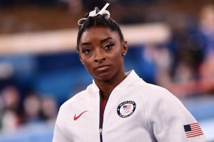 USA's Simone Biles waits for the final results of the artistic gymnastics women's team final during the Tokyo 2020 Olympic Games at the Ariake Gymnastics Centre in Tokyo on July 27, 2021. (Loic VENANCE / AFP) (Photo by LOIC VENANCE/AFP via Getty Images)​