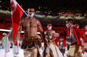 Olympic Tonga flag bearer Pita Taufatofua Tokyo 2020 2021 Taekwondo kayak skiing.