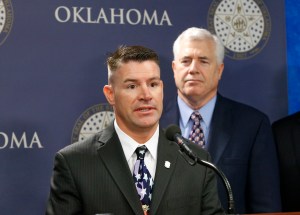In this April 12, 2013, file photo, Oklahoma state Rep. John Bennett, R-Salisaw, speaks during a news conference in Oklahoma City. Bennett has authored a bill allowing anyone with a valid handgun license to carry the weapon inside what he calls “the peopl