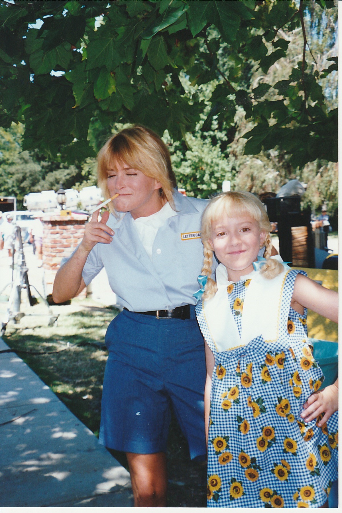 Susan Olsen, the original Cindy, and Olivia Hack shooting while shooting a deleted The Brady Bunch Movie scene.jpg