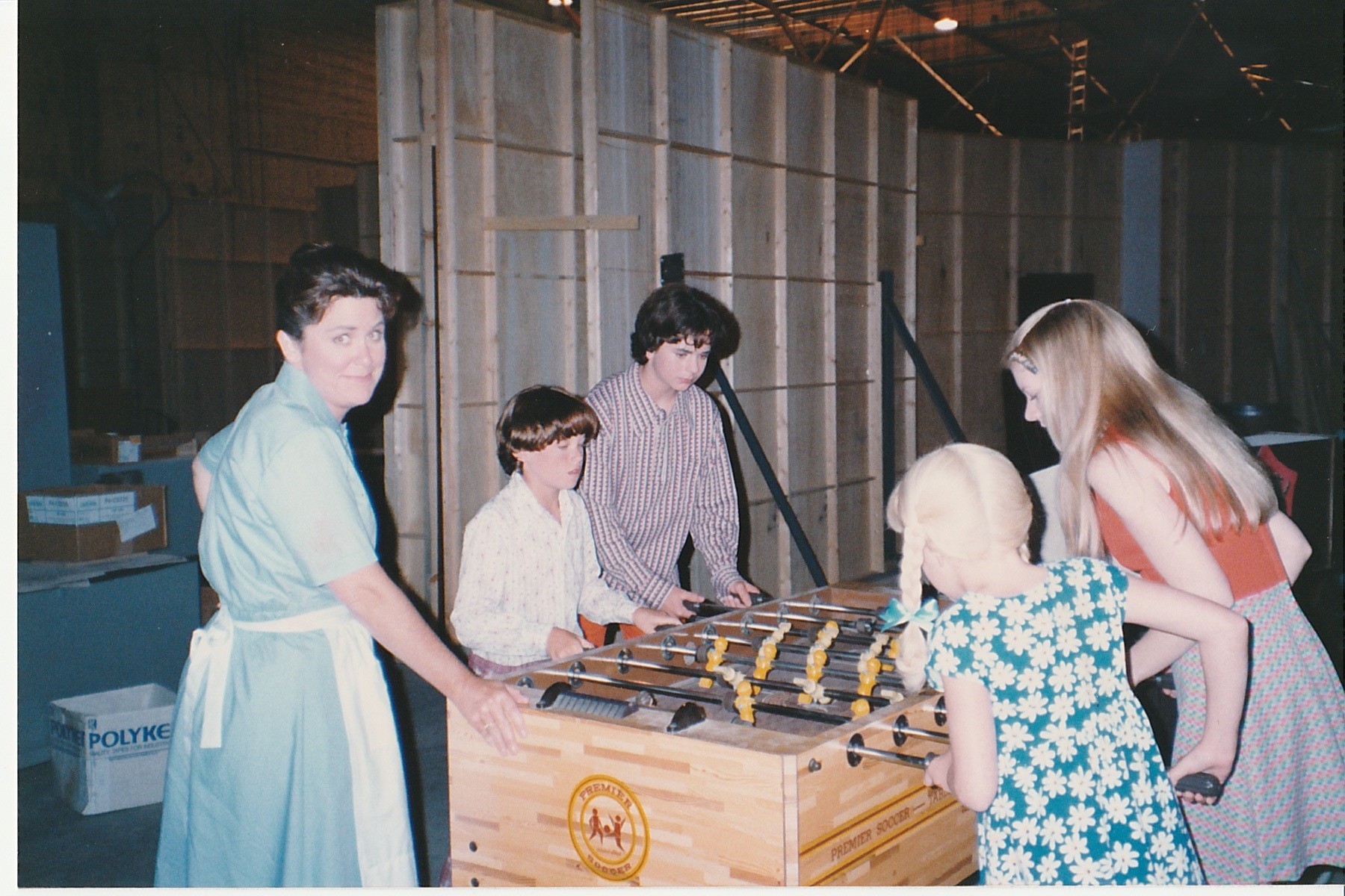 Henriette Mantel and the kids playing foosball on set.jpg