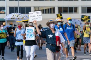 People participate in a rally to support voting rights at the Texas State Capitol on July 31, 2021, in Austin, Texas.