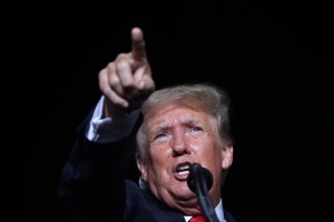 Former U.S. President Donald Trump addresses supporters during a "Save America" rally at York Family Farms on August 21, 2021 in Cullman, Alabama.