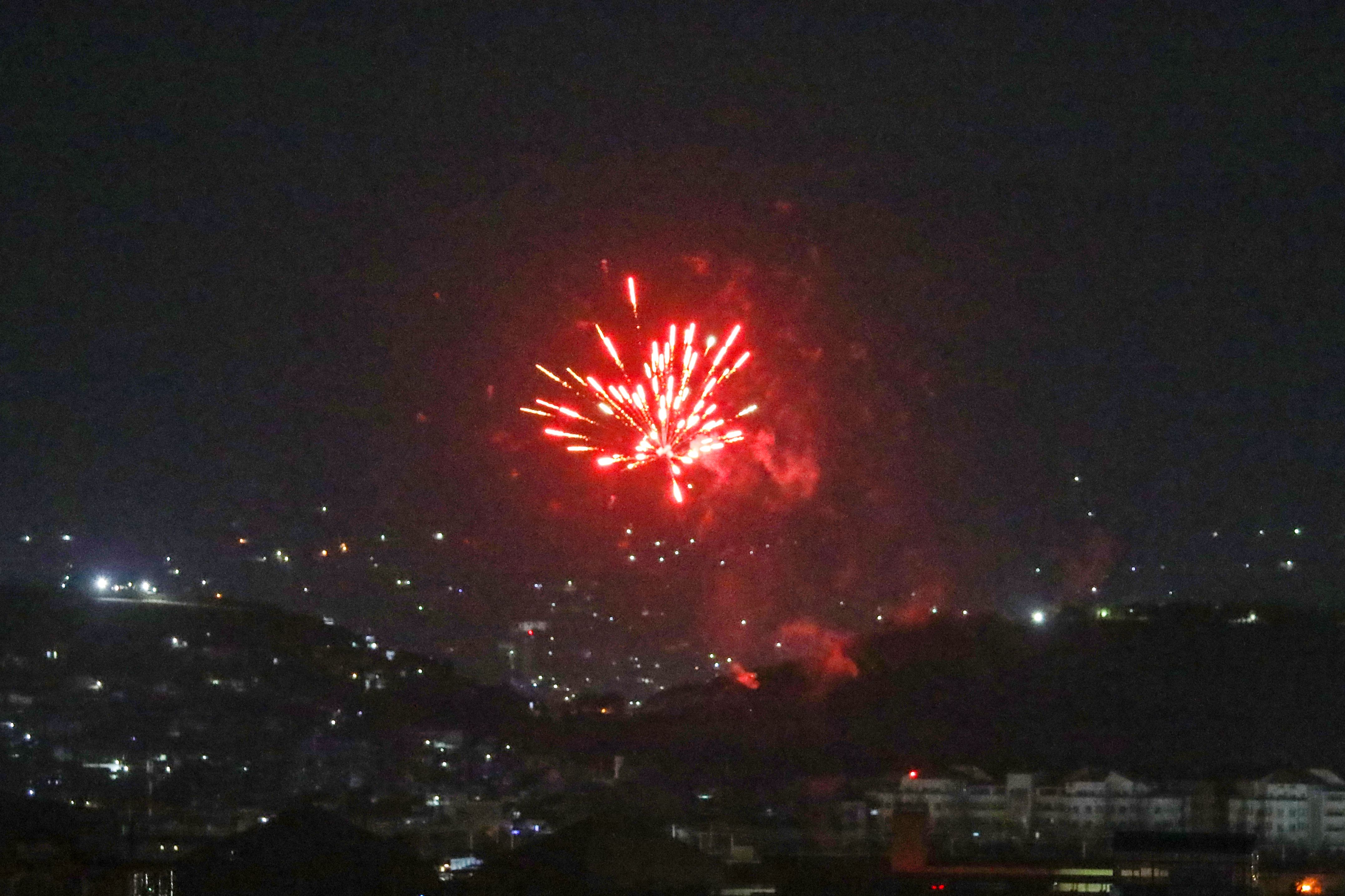 Fireworks are seen in Kabul on the night that US troops left the country, ending a 20-year war that it lost. Photo: AFP via Getty Images