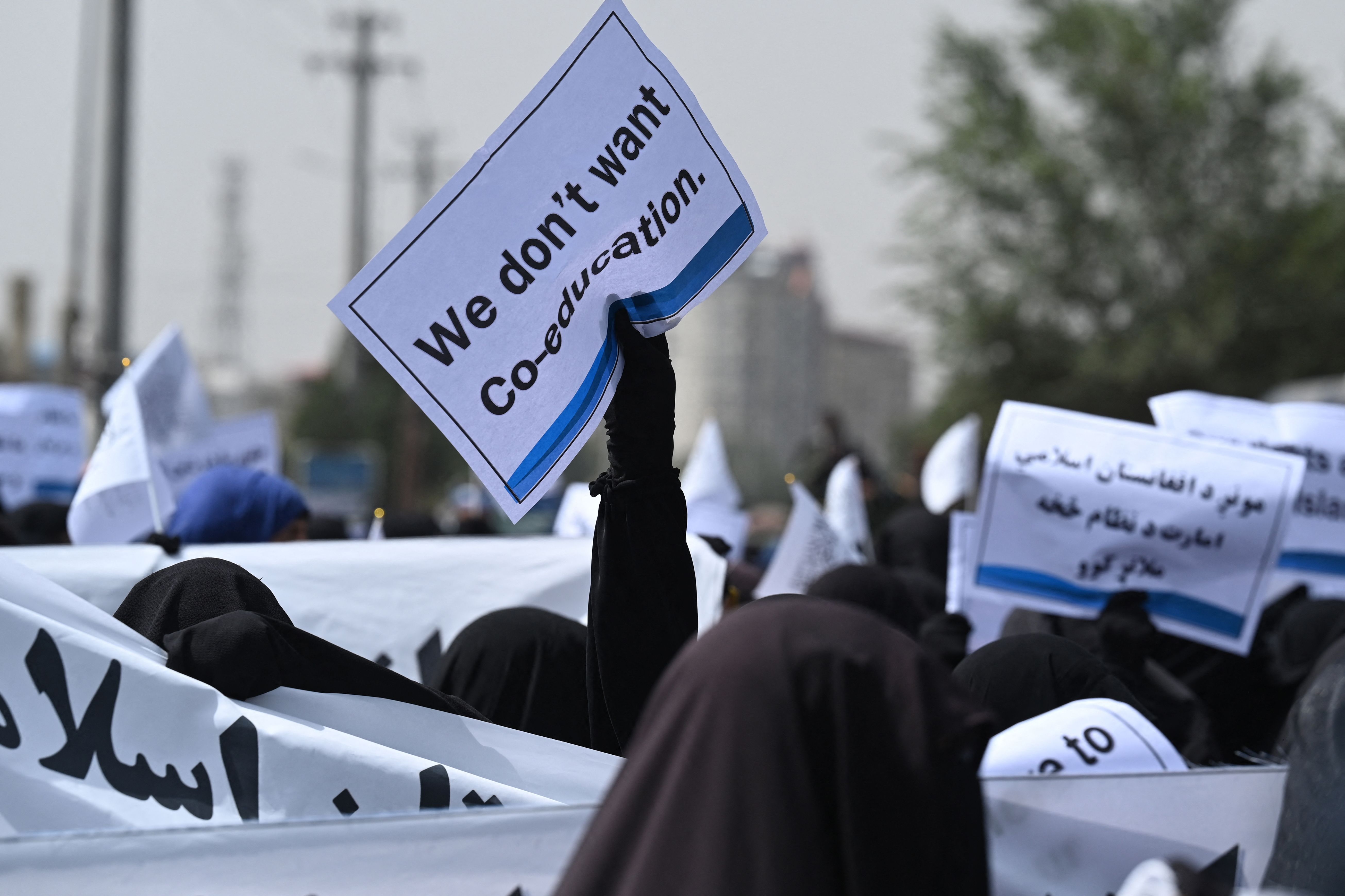 Veiled women hold a pro-Taliban rally in Kabul on the 20th anniversary of the 9/11 attacks. Photo: AAMIR QURESHI/AFP via Getty Images