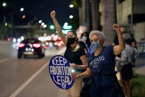 ​People gather in Ft. Lauderdale, Florida in support of abortion access and for a candlelight vigil to honor Ruth Bader Ginsburg on Saturday, September 19, 2020.