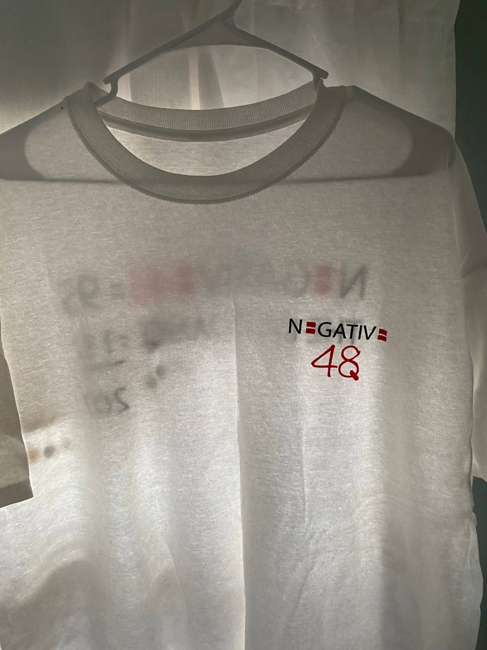 A T-shirt given to followers of Michael Protzman who traveled to Dallas to see JFK reappear. Credit: Maureen McNamara