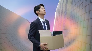 Photo of young man holding office equipment
