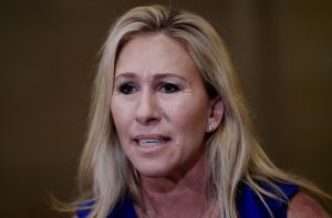 US Republican Representatives Marjorie Taylor Greene of Georgia, speaks to reporters on Capitol Hill in Washington, DC, October 21, 2021. (OLIVIER DOULIERY/AFP via Getty Images)