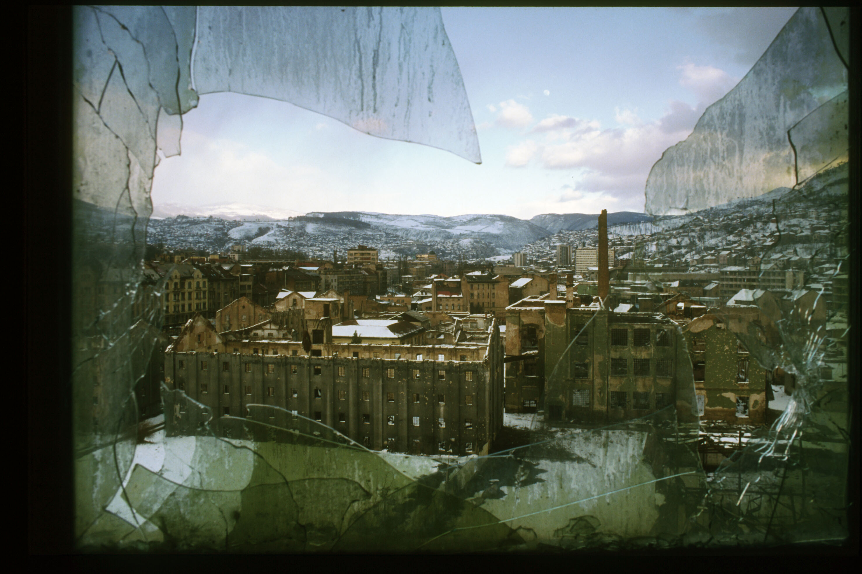 Sarajevo pictured through a broken window in the Parliament building in 1996. Photo: Roger Lemoyne/Liaison