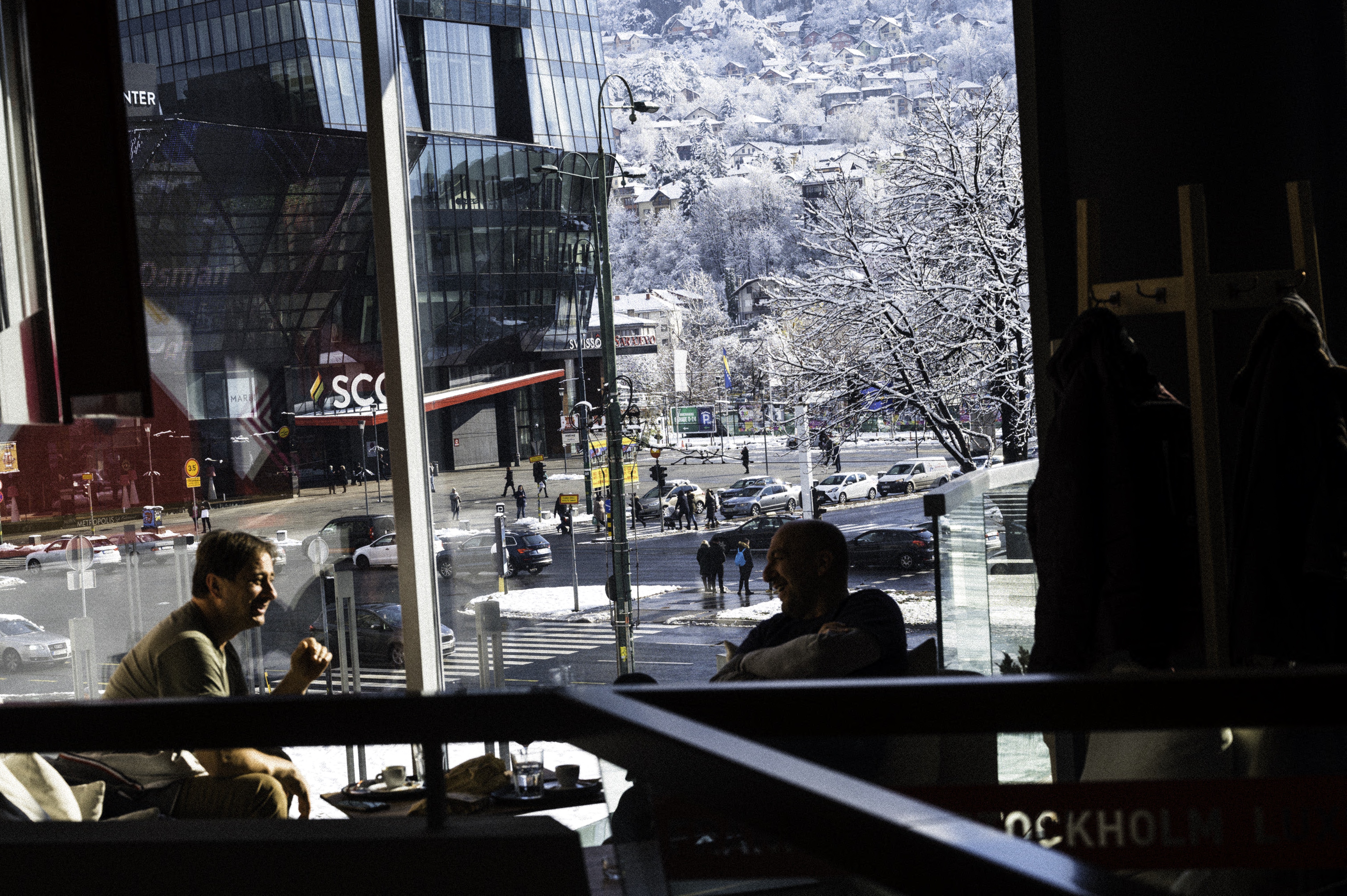 A cafe in Sarajevo with a view towards the mountains where artillery pounded the city during the war. Photo: Mitchell Prothero