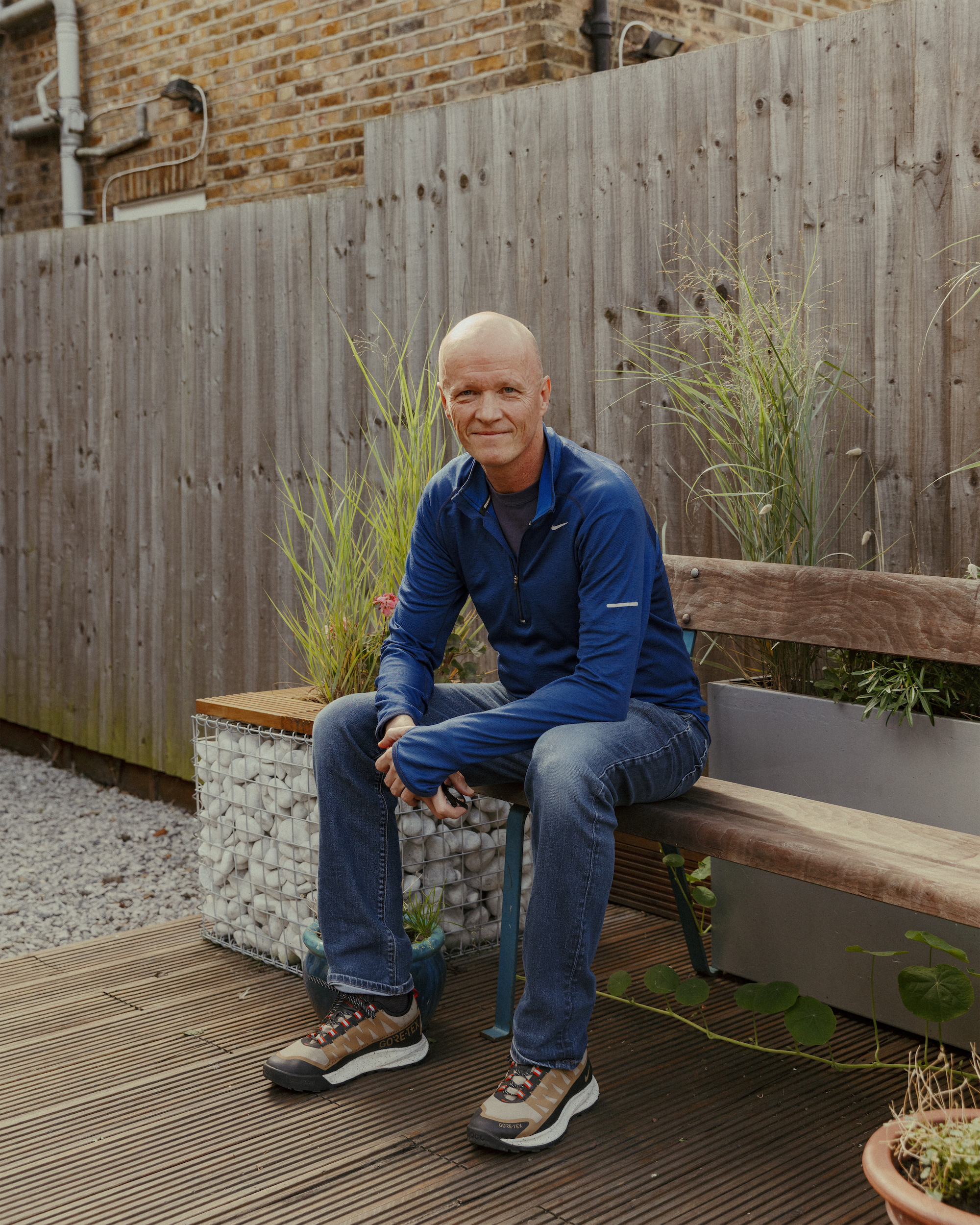 Rob White, sitting in his back garden
