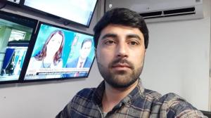 Shabir Ahmadi in the TOLOnews newsroom in 2021