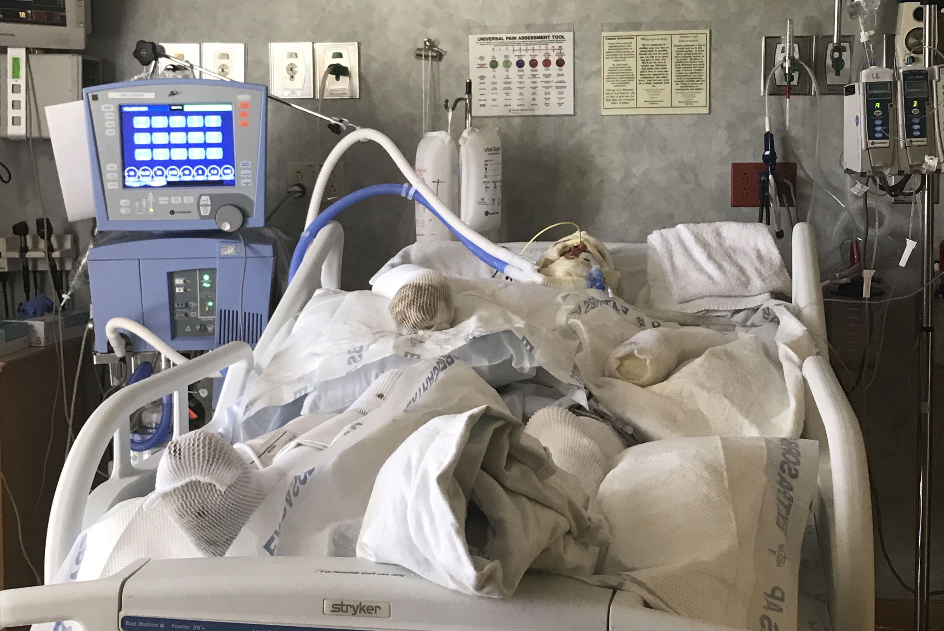 Mark in Hospital bed.jpeg