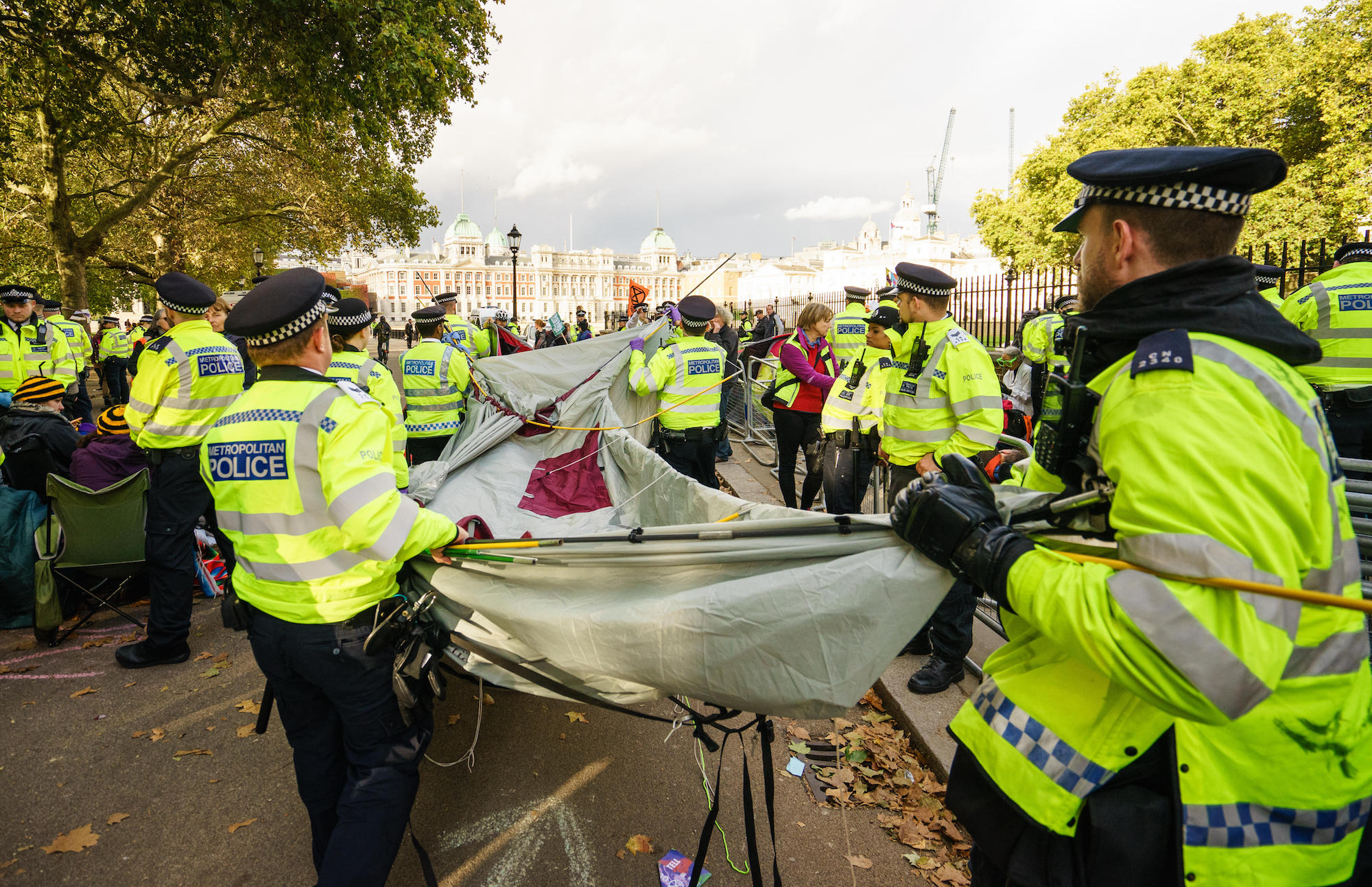 Police clearing Extinction Rebellion tents in London.