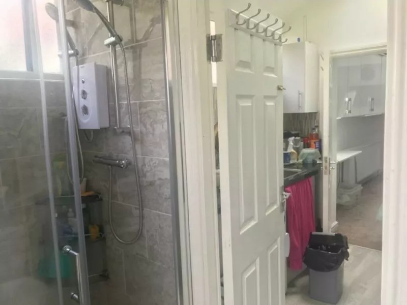 The two showerheads in the bathroom
