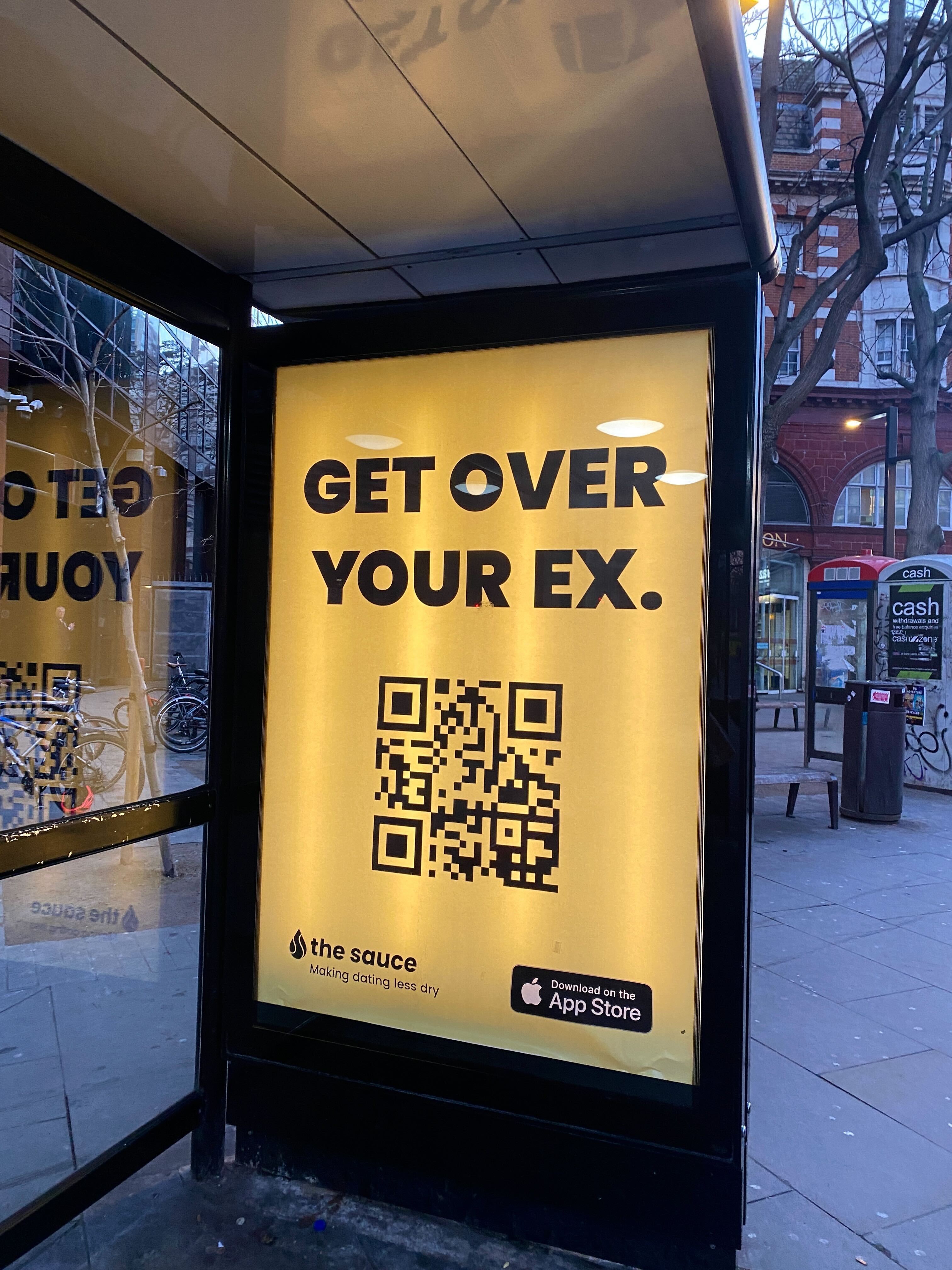 A billboard advertising dating app The Sauce