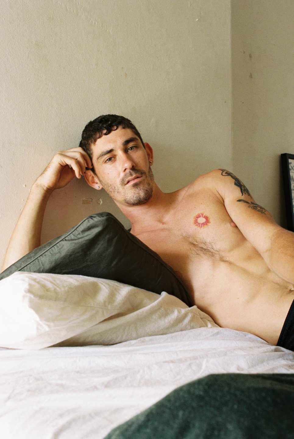 Myles topless lying on his bed by Dylan Tarbett