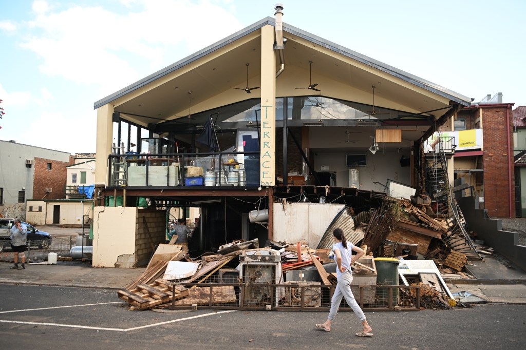 Australian Troops Seen Taking Photos and Drinking Coffee While Flood Victims Lead Recovery Efforts
