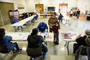Volunteers help sign in voters on November 3, 2020 in Lumberton, North Carolina.