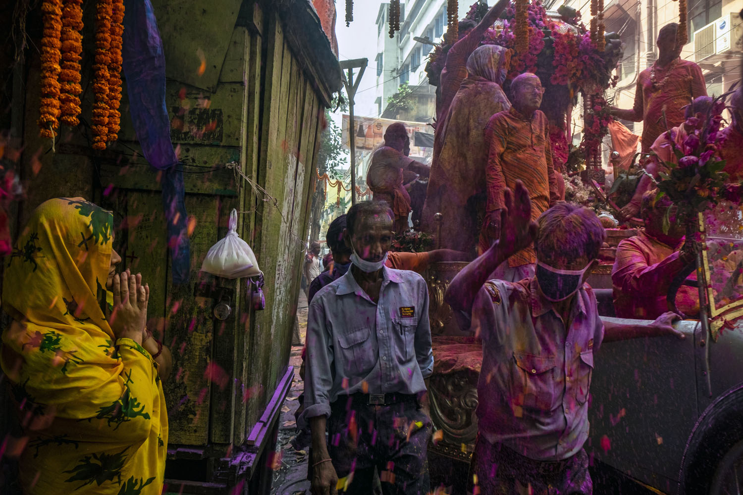 Holi celebration in Kolkata, India, inside a Rolls Royce car