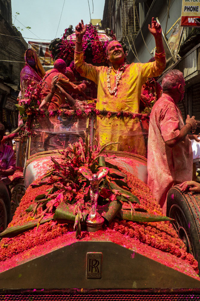 Holi celebration in Kolkata, India, inside a Rolls Royce car