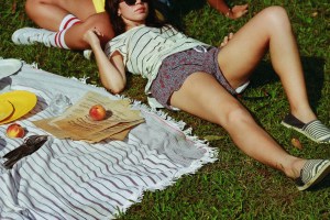 A young woman relaxes in the sun