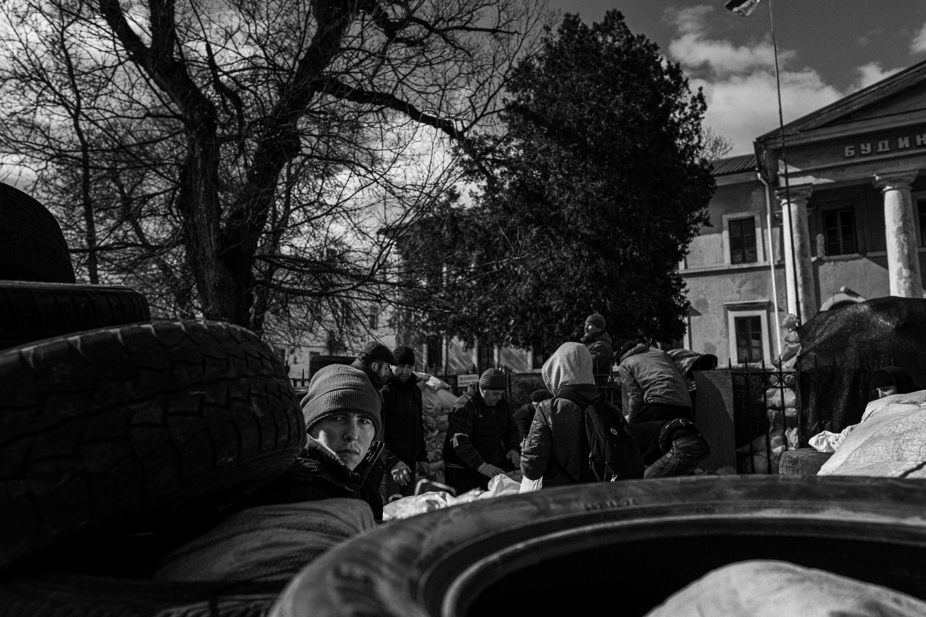 Civilians set up barricades.