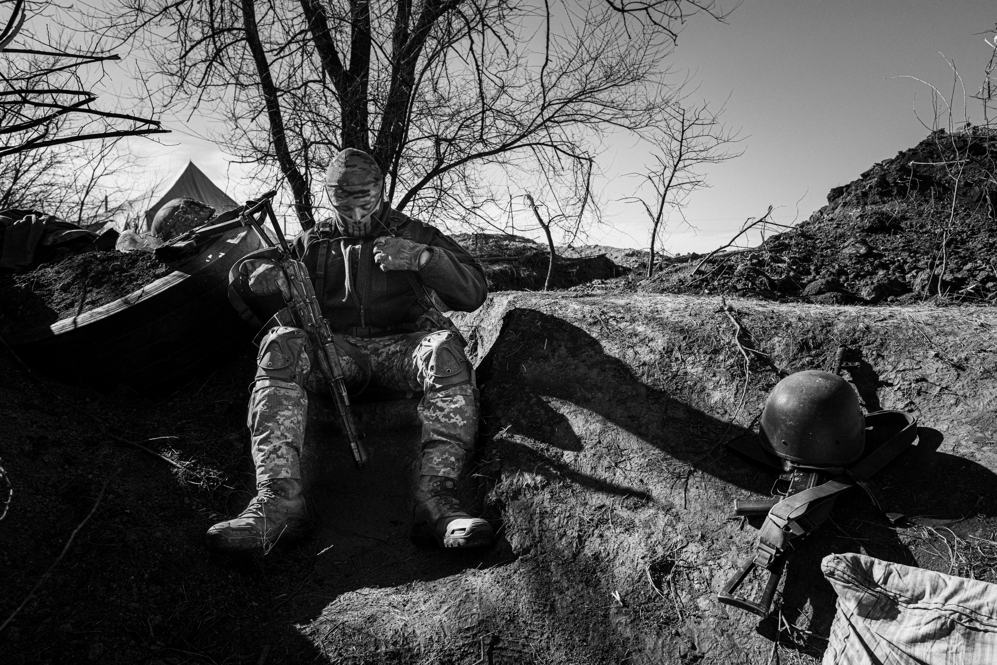 A soldier prepares to fight on the front lines.