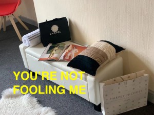 A Chanel and Harvey Nichols bags in a studio flat for rent in Leeds