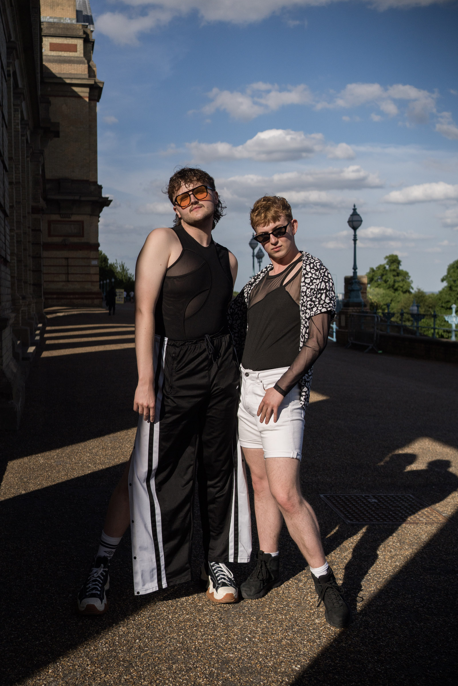 Two Charli XCX fans at Alexandra Palace, London, both in black and white