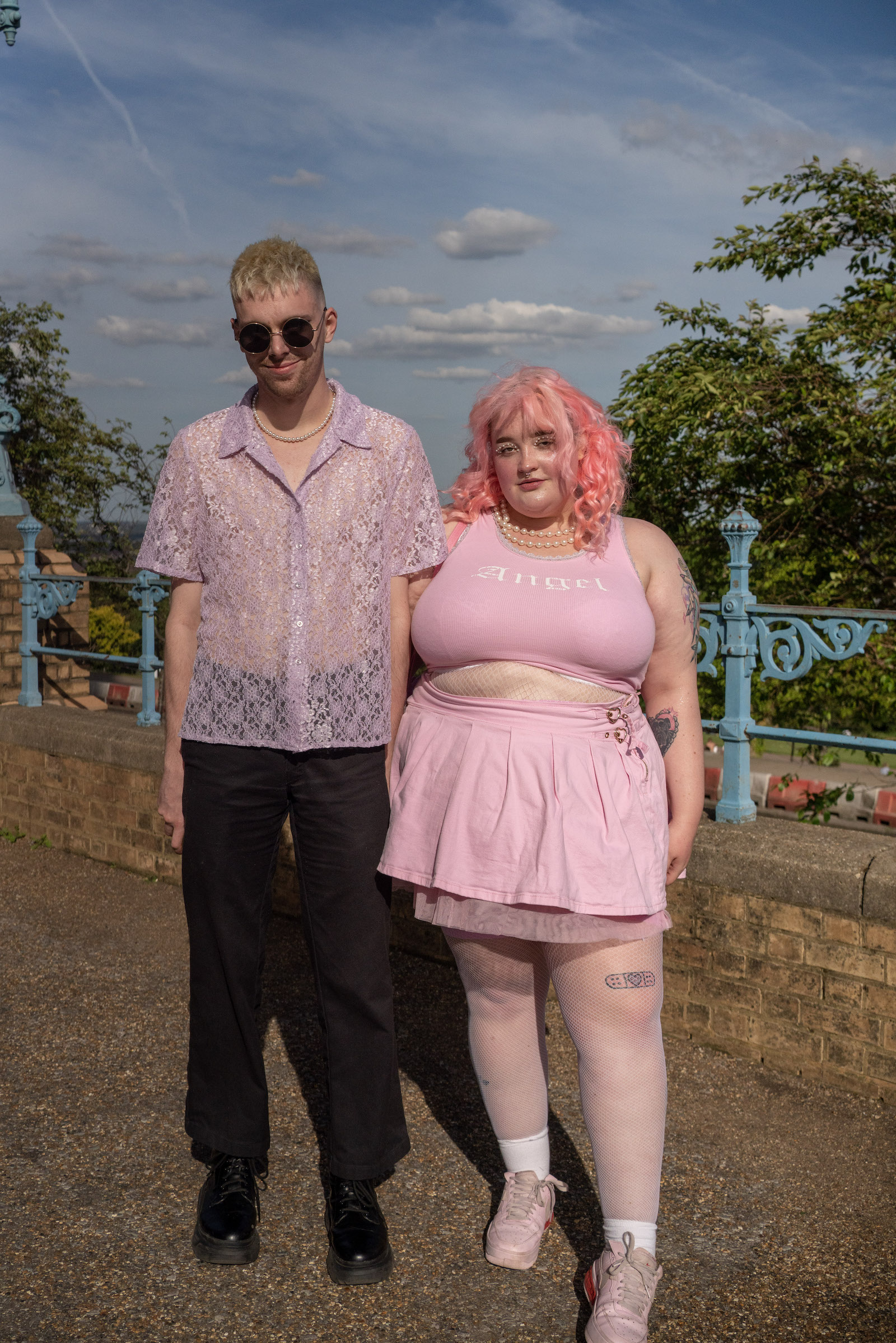 Two Charli XCX fans at Alexandra Palace, London, both dressed in pink