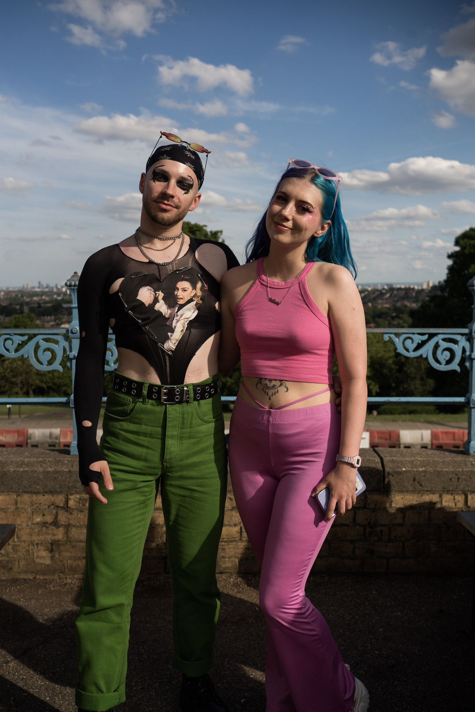Two Charli XCX fans at Alexandra Palace, London, dressed in pink and green