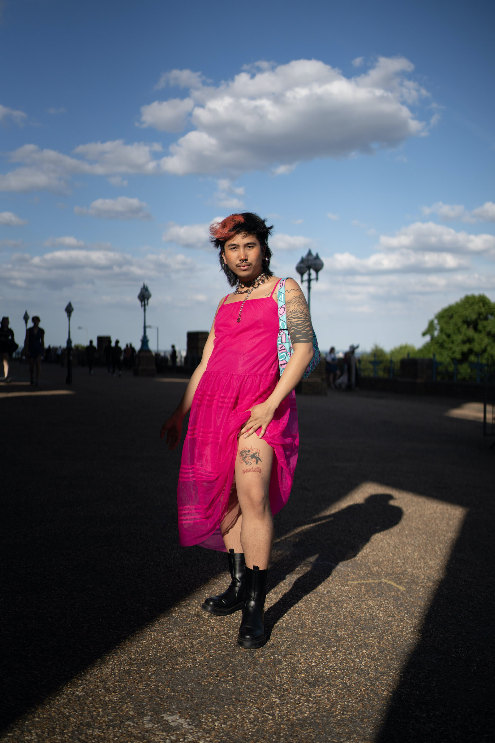 A Charli XCX fan at Alexandra Palace, London in a pink dress
