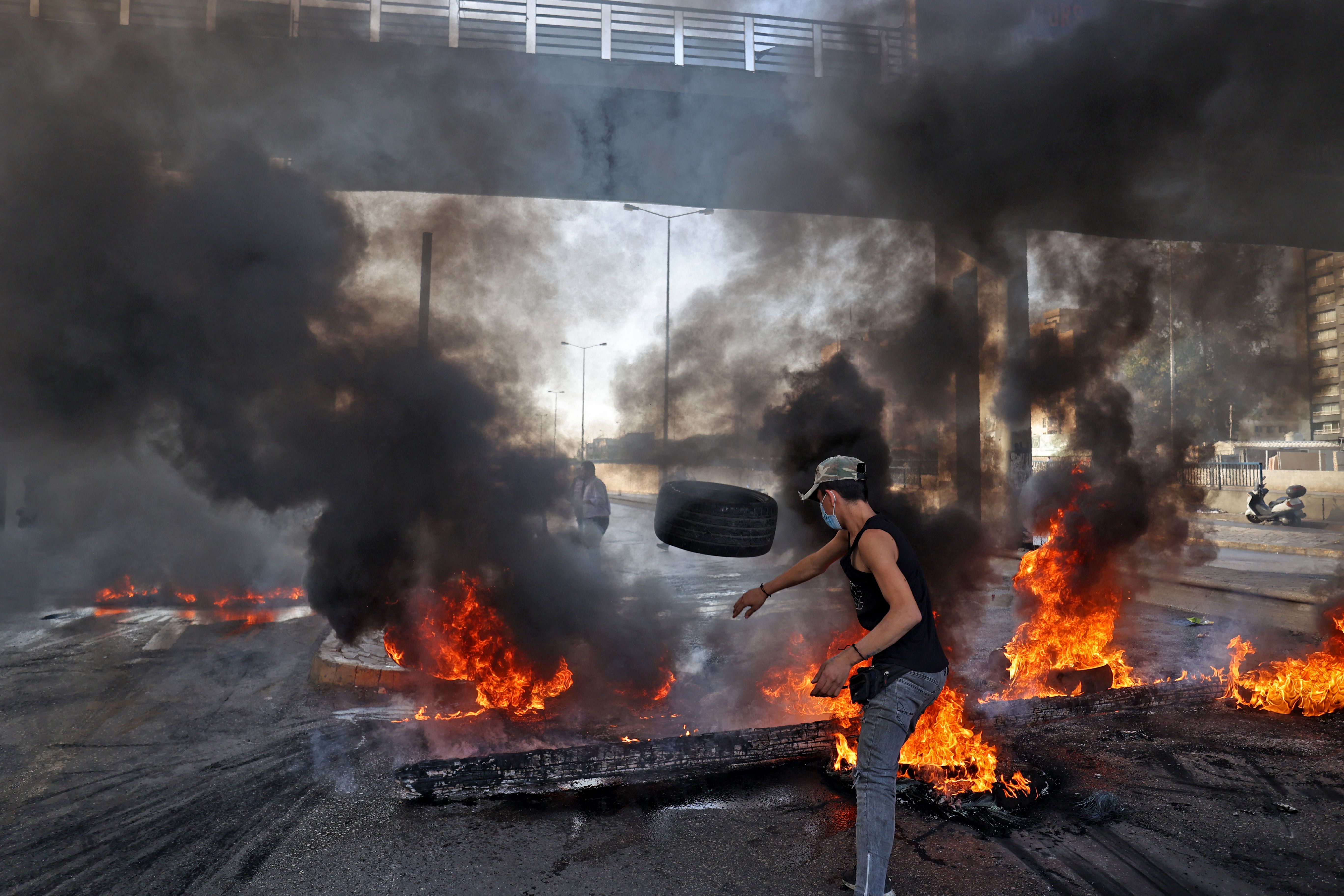 Protesters bock a road in Beirut last year as Lebanon struggled with a deep economic crisis. Photo: Anwar AMRO / AFP) (Photo by ANWAR AMRO/AFP via Getty Images