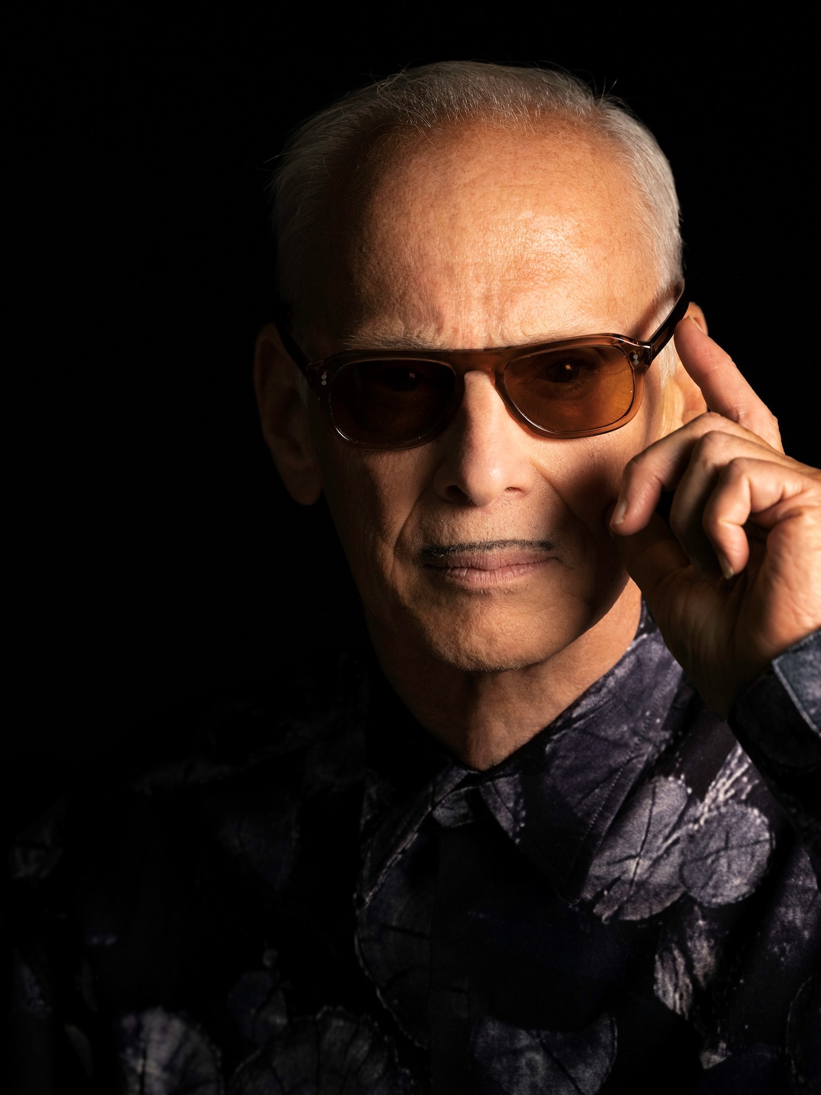 John Waters in sunglasses. Photo by Greg Gorman.