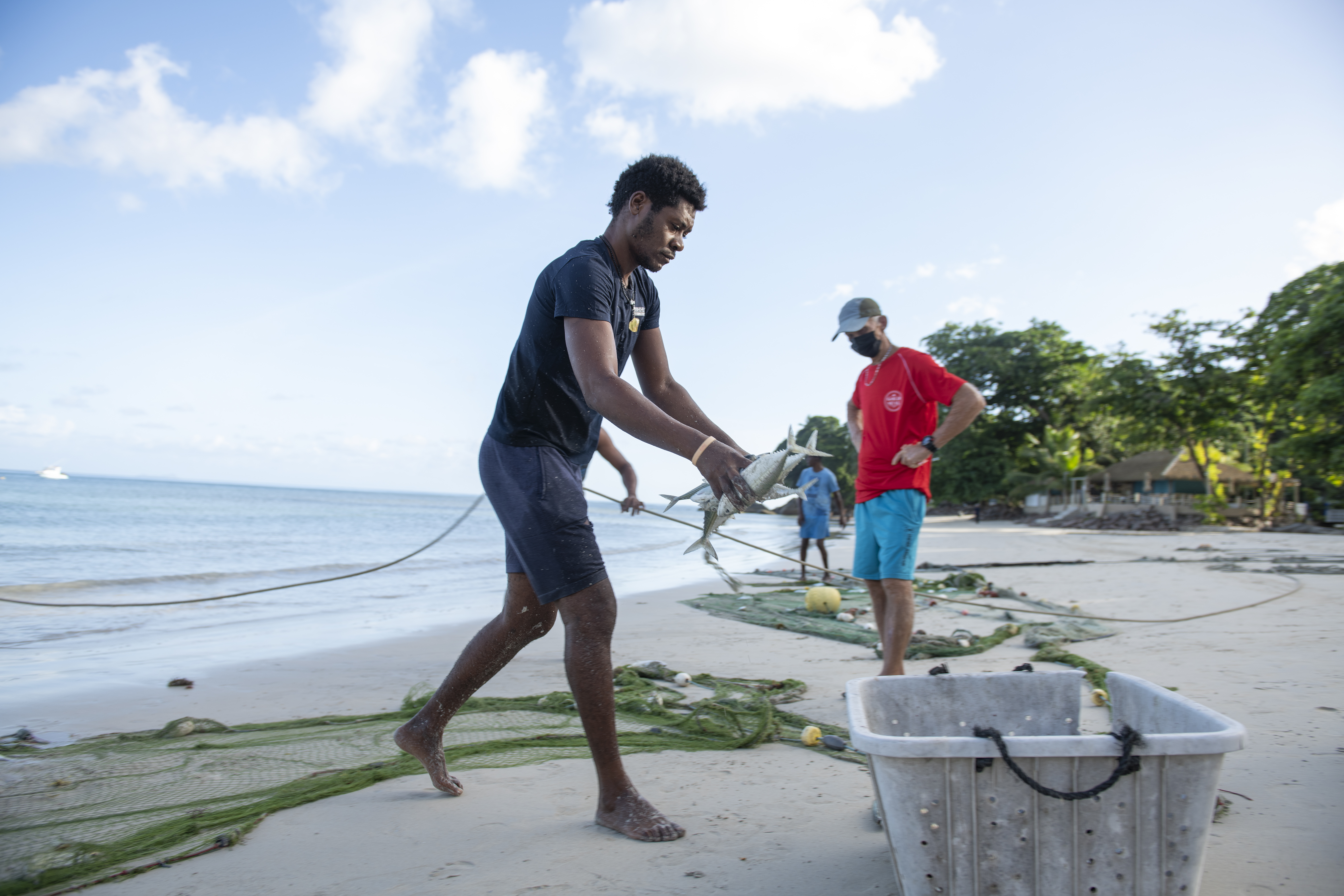 Local Fishers catch Mackerel on Beau Vallon Beach, Mahé, Seyshelles Indian Ocean