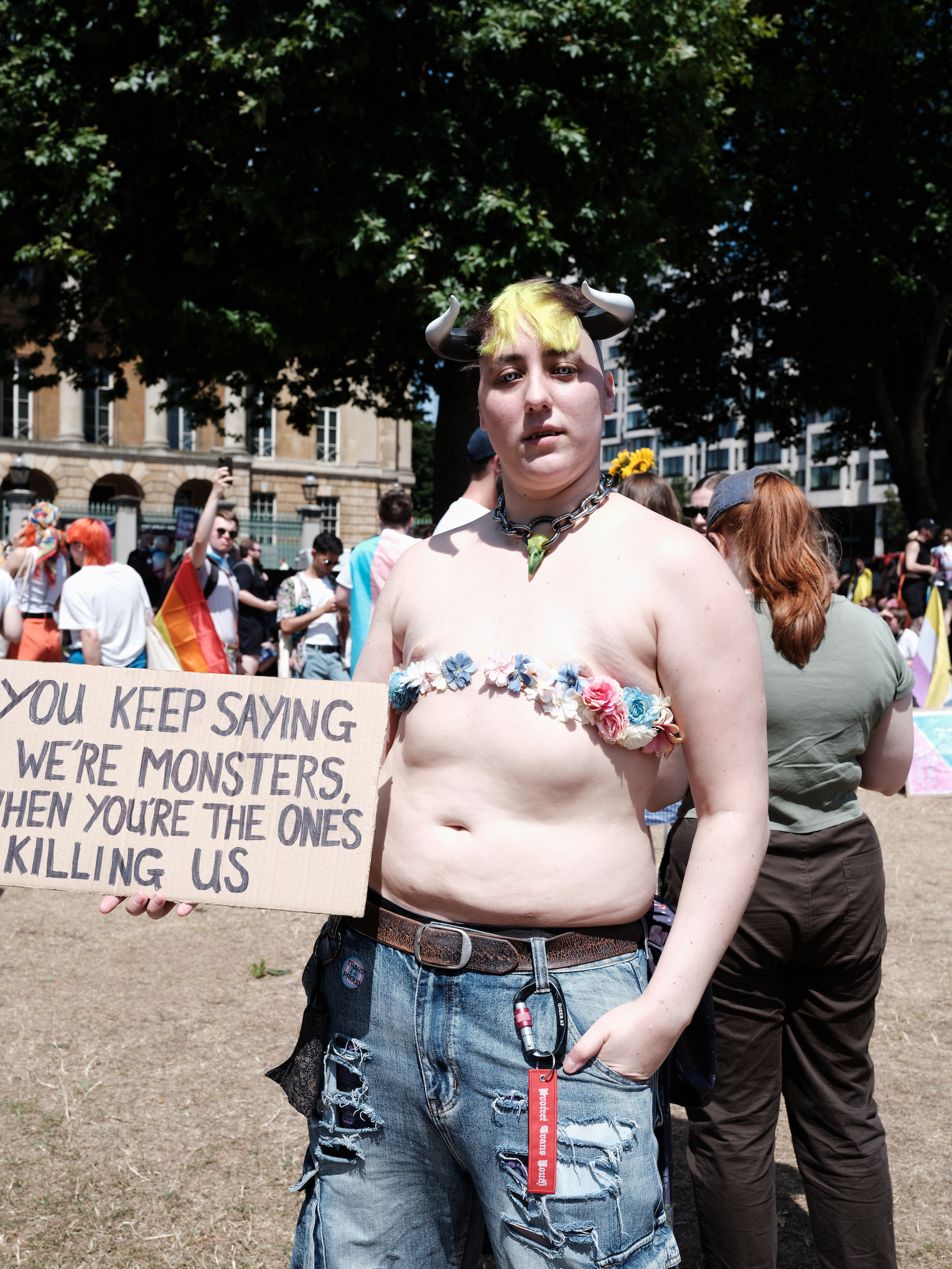 Protester holding a sign at London Trans+ Pride 2022