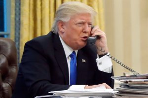 In this Jan. 28, 2017, file photo, President Donald Trump speaks on the phone with Prime Minister of Australia Malcolm Turnbull in the Oval Office of the White House in Washington.