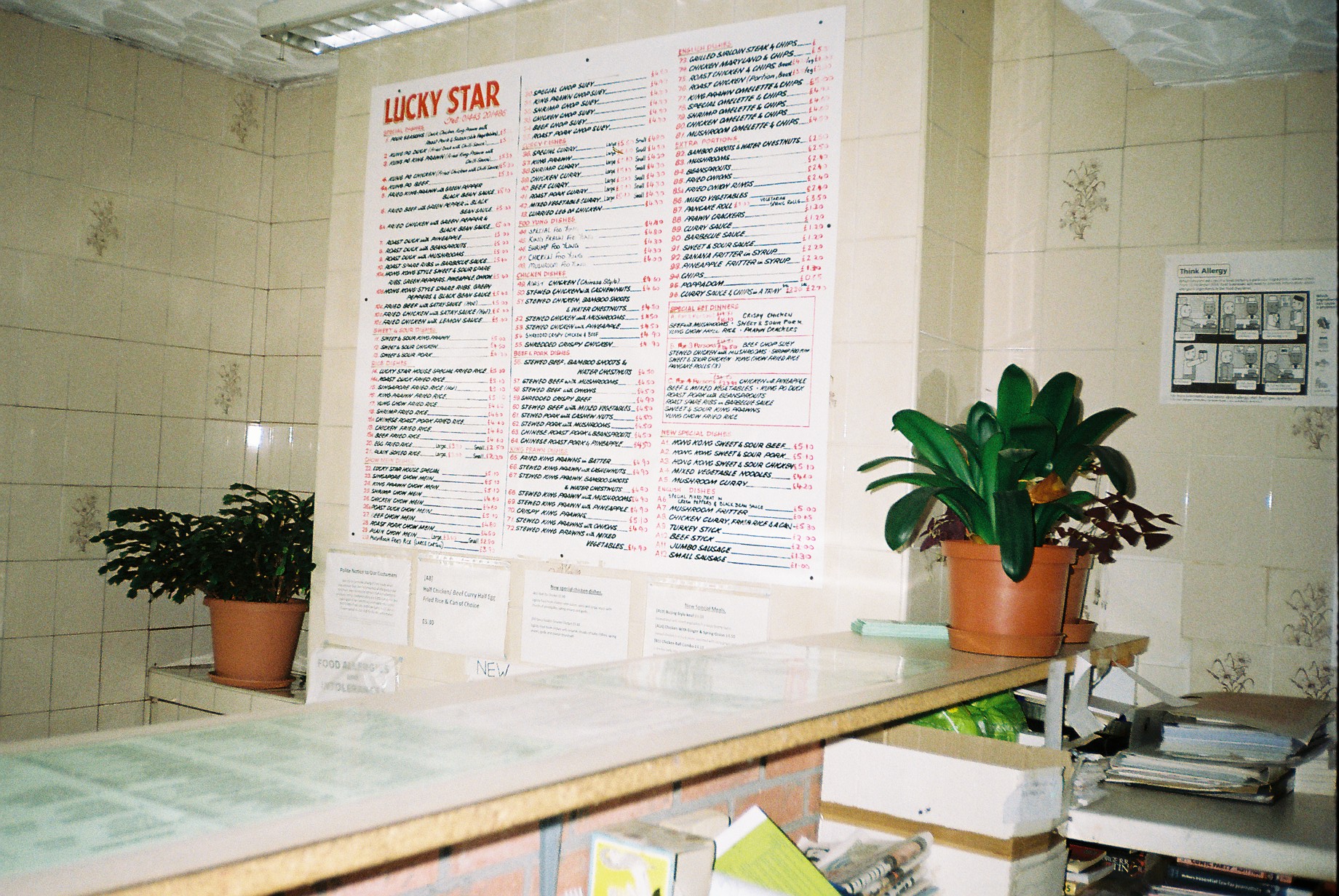 The takeaway board at Lucky Star takeway in Wales, 1995