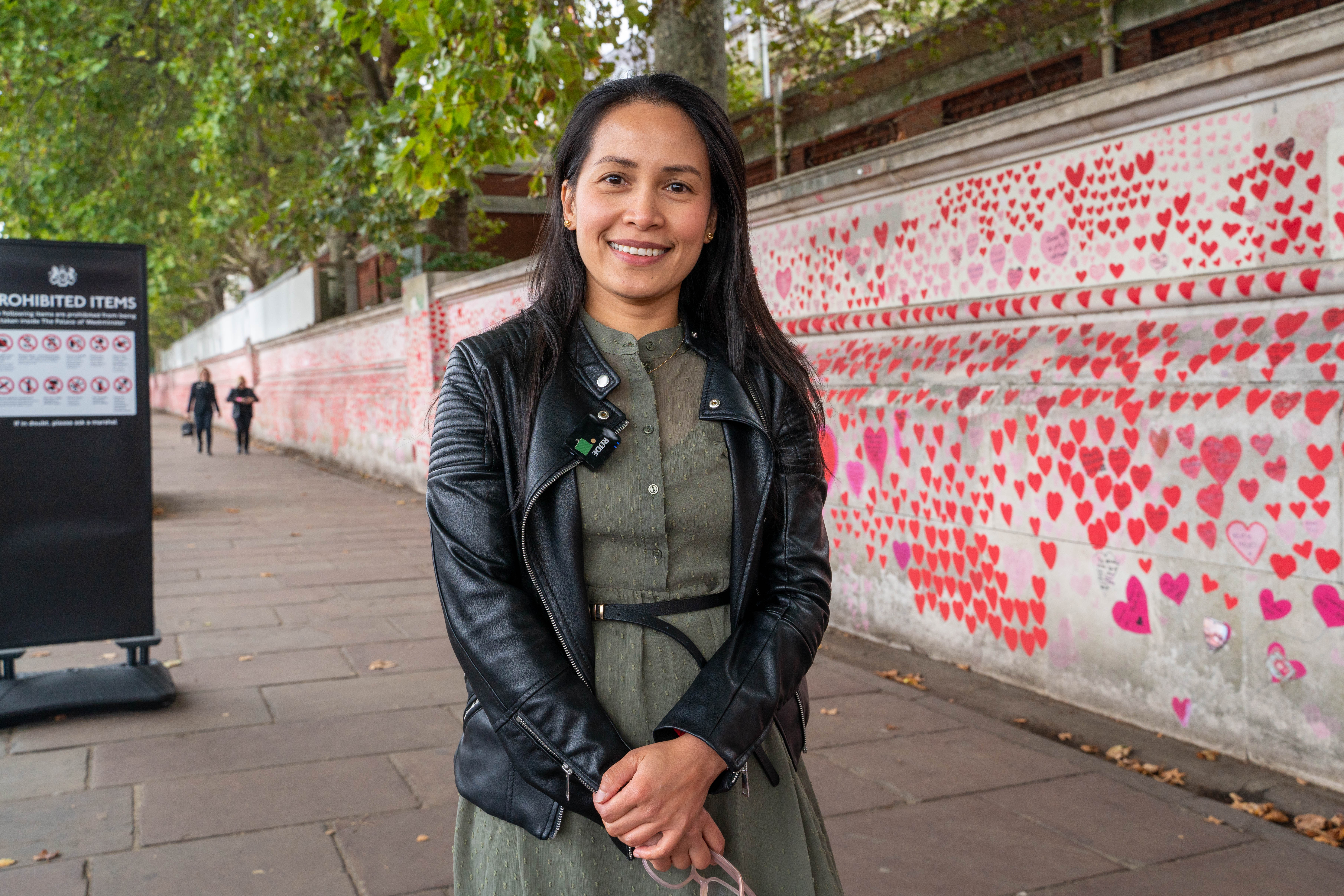 A Philippino woman in the queue to see the Queen lying-in-state