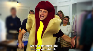 A man in a hotdog outfit
