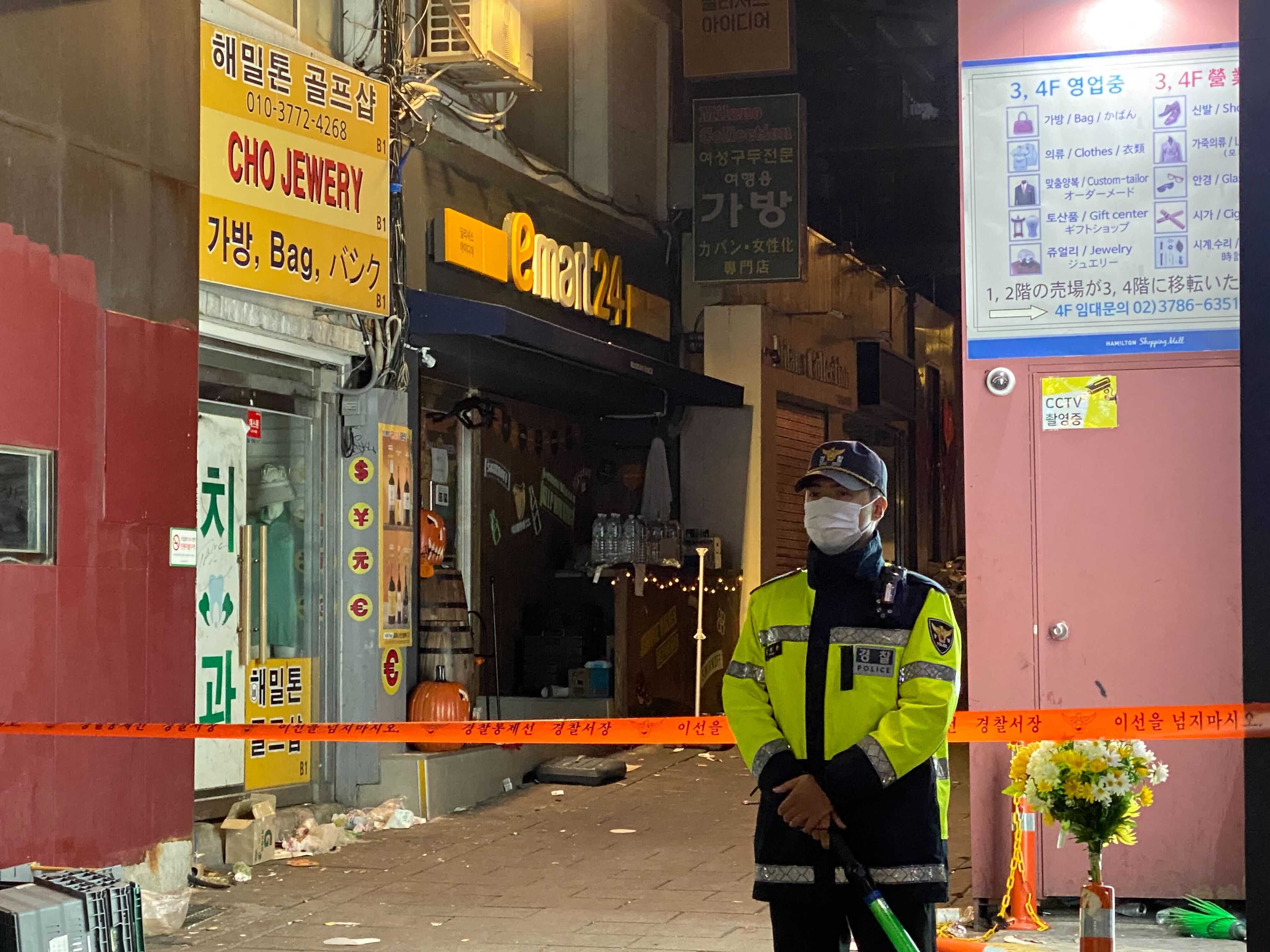 The recessed entryway of a convenience store sheltered Mun from the surging crowds. Photo: Junhyup Kwon