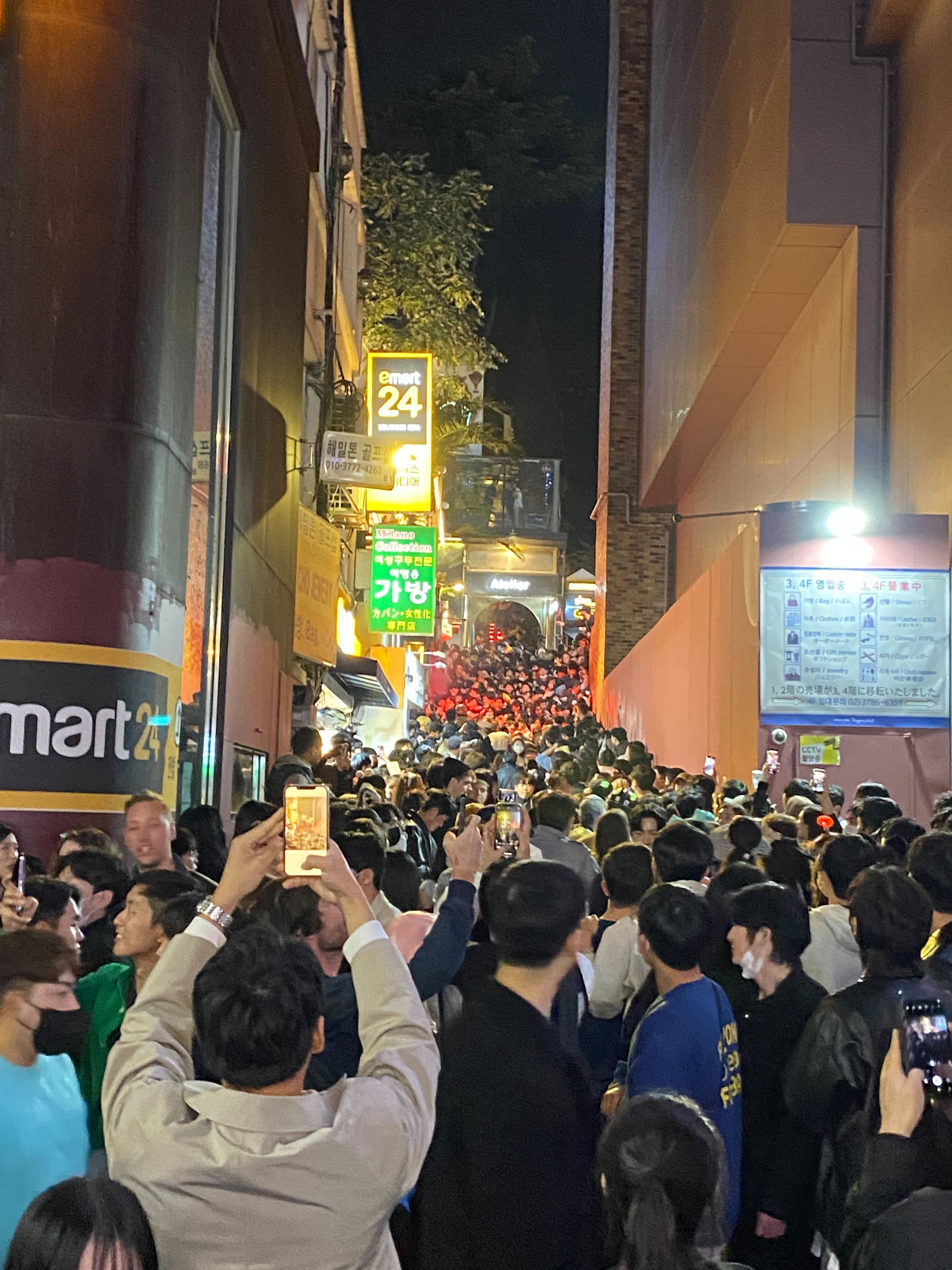 A view of the deadliest spot in Itaewon last Saturday from the bottom of the sloped alley. Photo: Junhyup Kwon/VICE