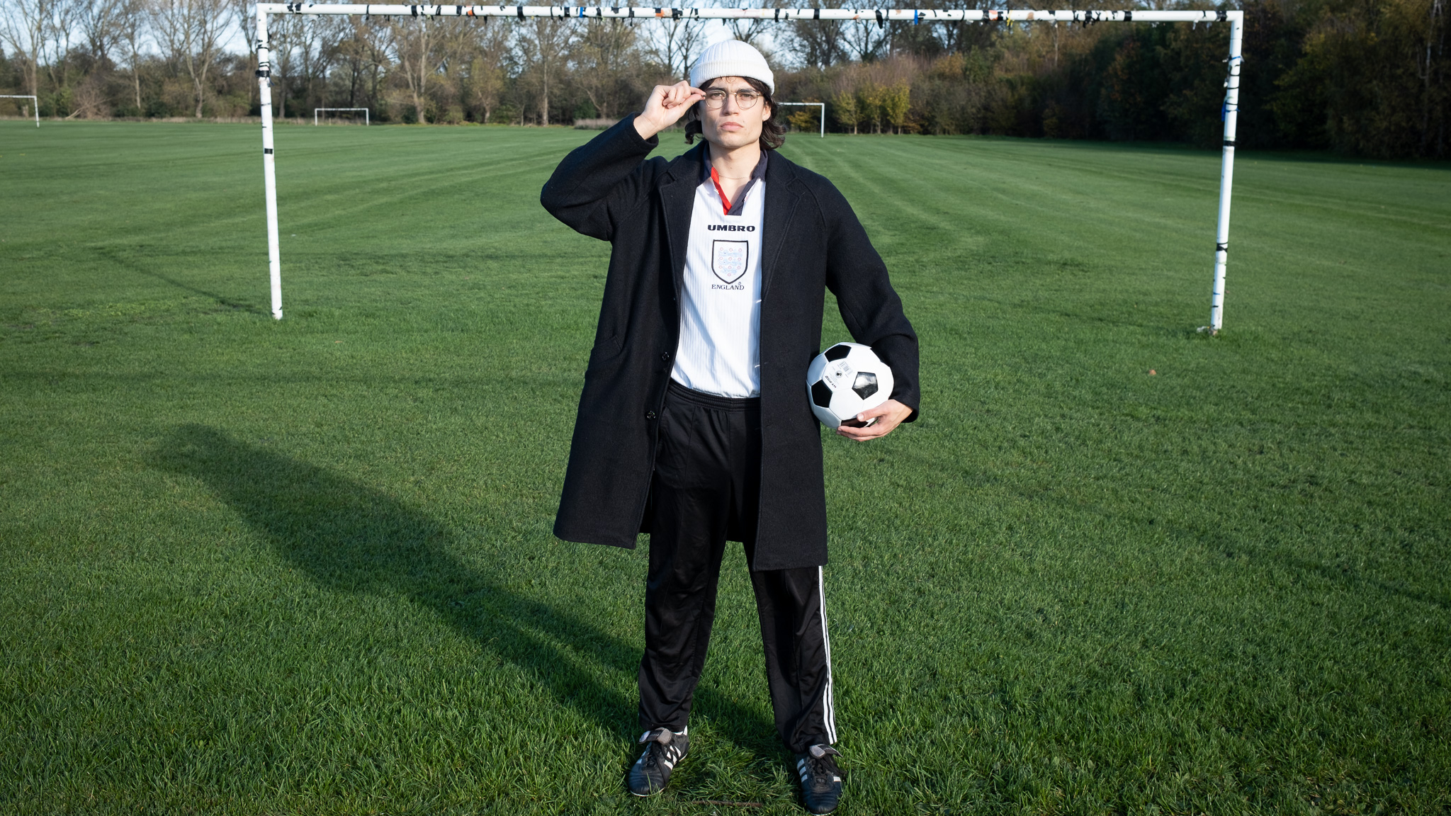 Man dressed as intellectual football fan
