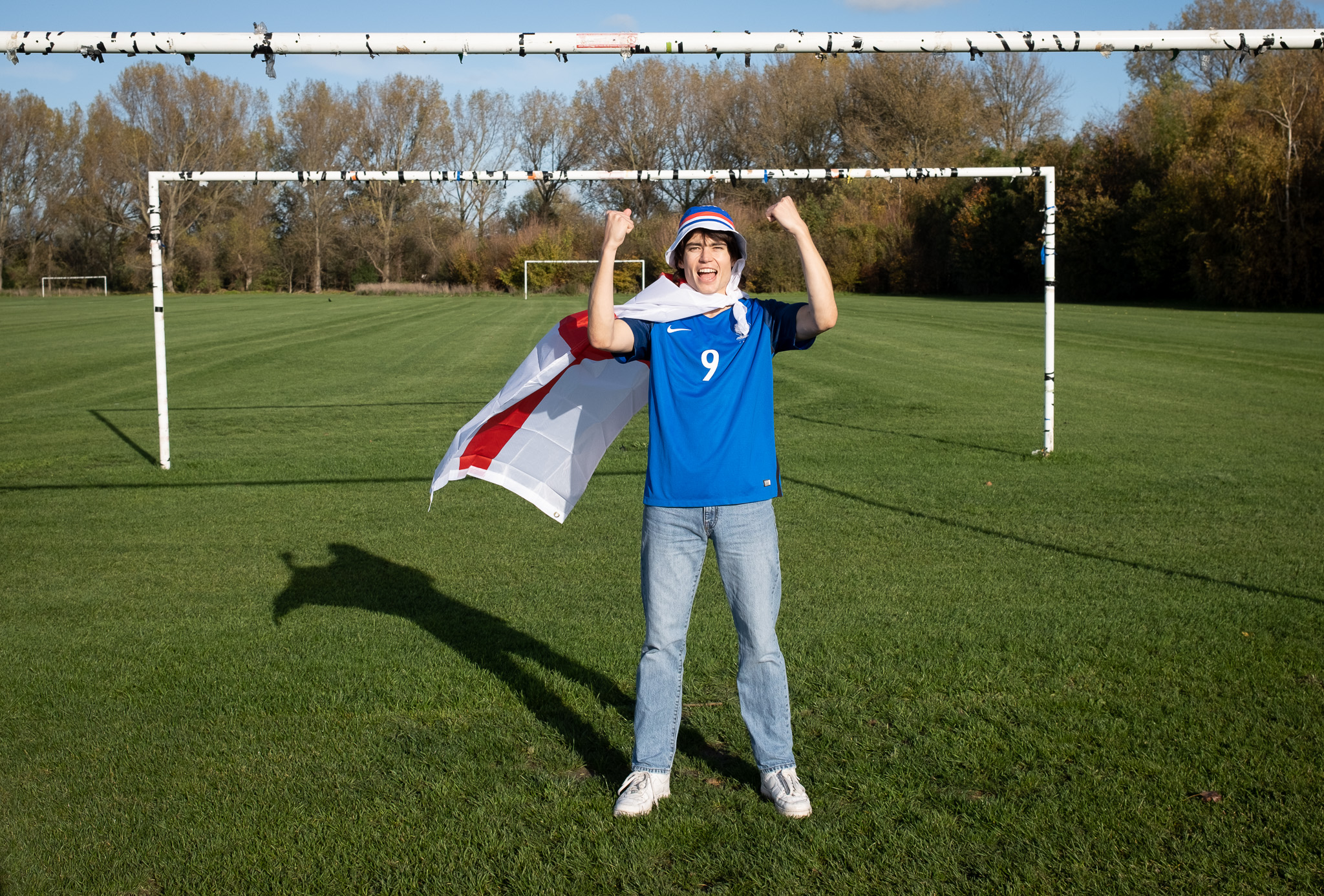 Man dressed as football fan who supports too many teams