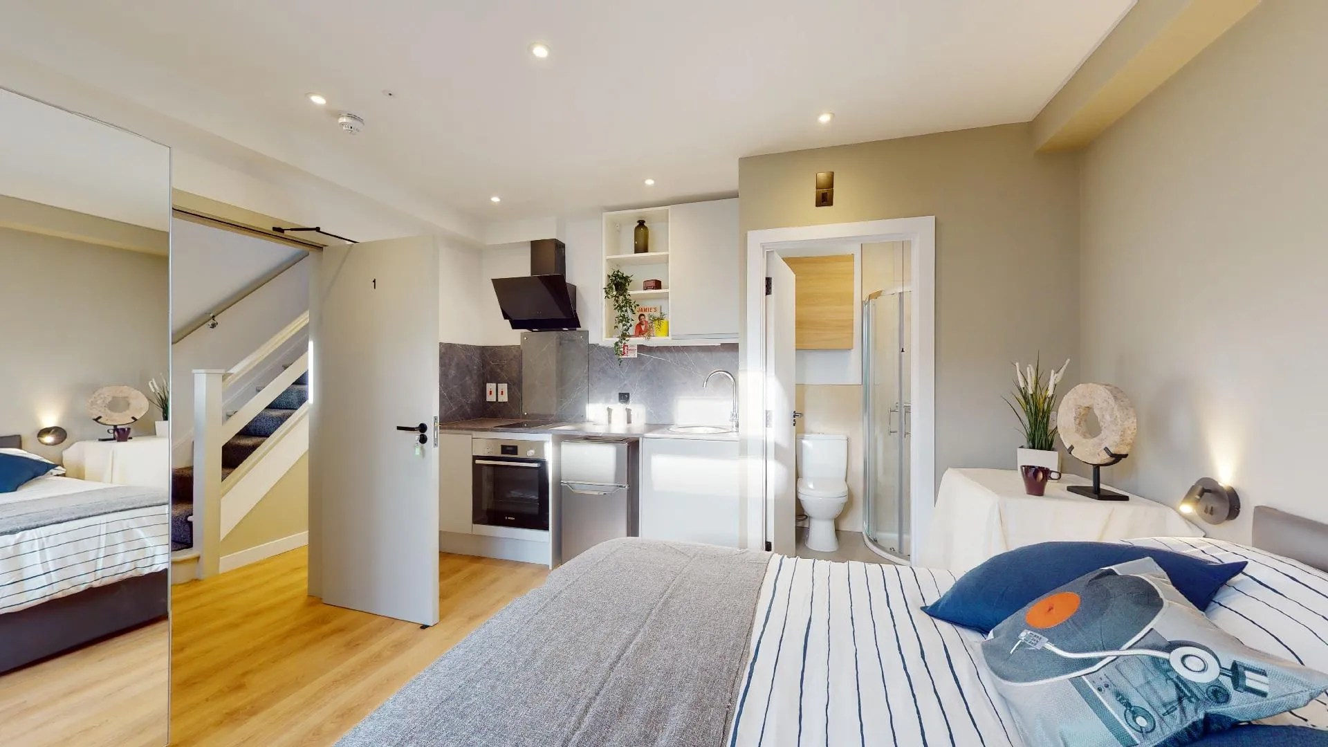 Bigger bedroom with kitchen in one-bed studio for rent in Acton, London