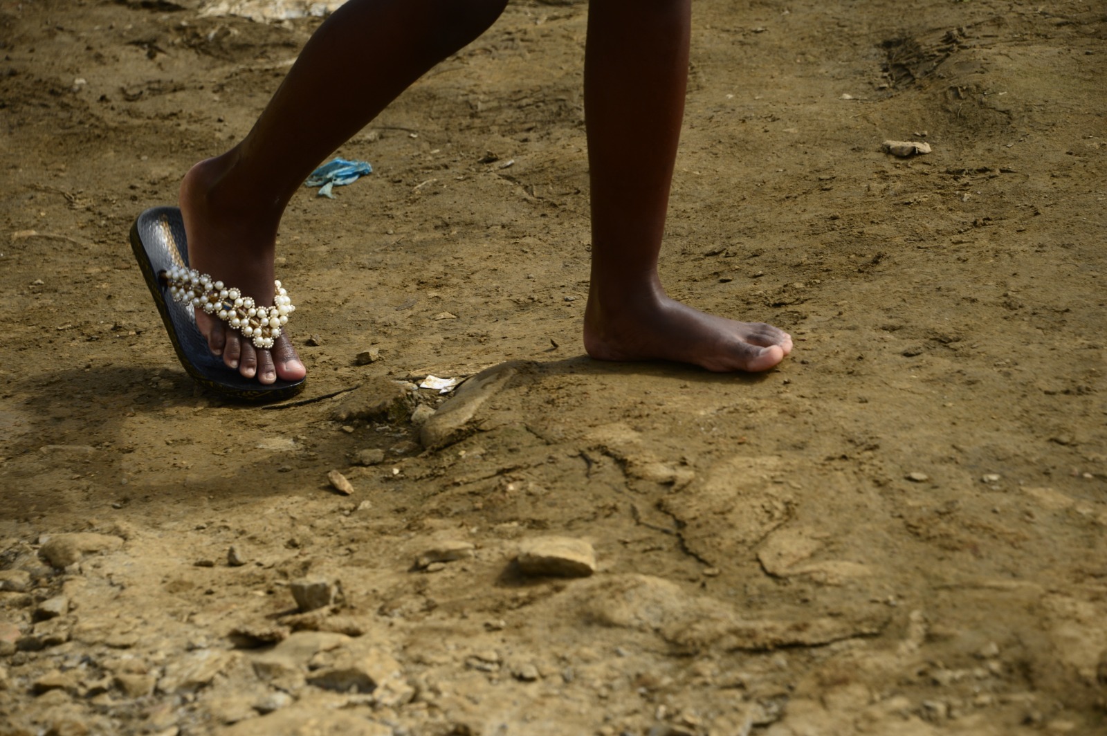 A child reaches a Panamanian government camp in Lajas Blancas after trekking through the Darién Gap.